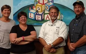 From Left to Right: Diane Gordon, Julie Clarke, Mark Latino, and Bob Latino are four of the five siblings who own and operate The Reliability Center.