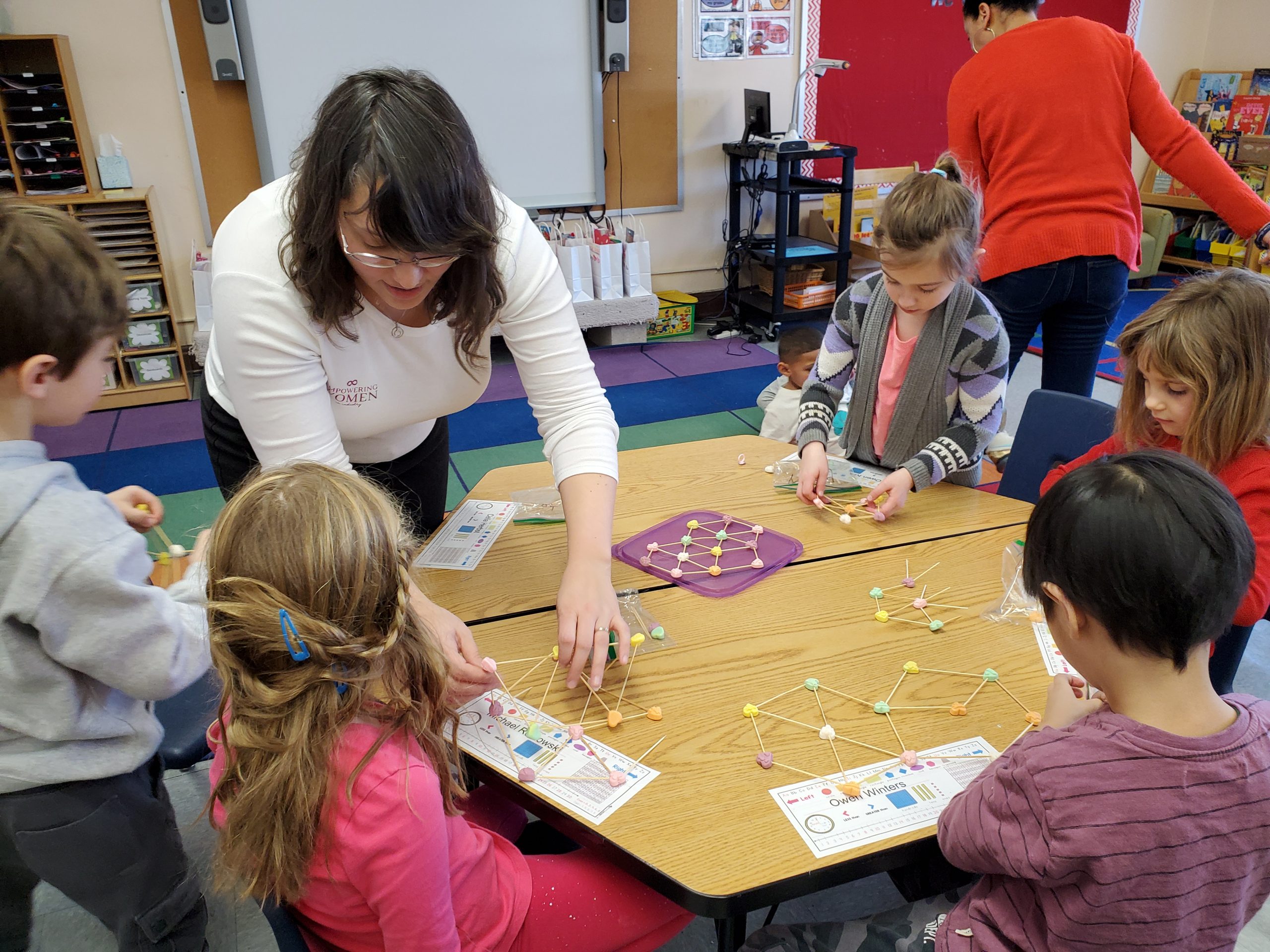 Cieana Detloff instructs a first grade class during Engineers Week
